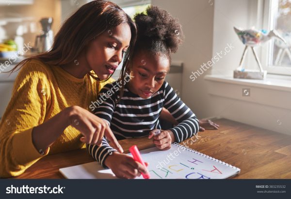 stock-photo-little-black-girl-learning-to-read-learning-the-alphabet-383235532